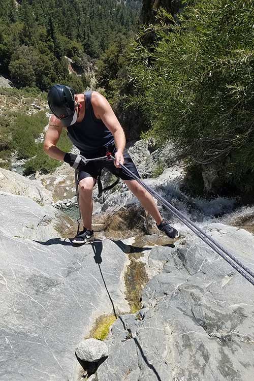 Overhead photo of a man rappelling while in adventure therapy for marijuana addiction treatment in Vista, CA.