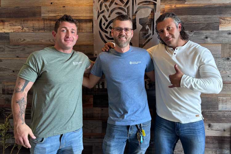 Chad, Kyle, and Drew smiling as a team of Sacred Journey Recovery in Vista, CA.