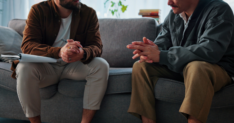 Therapist and client in a calm, safe office space during a trauma-informed care session
