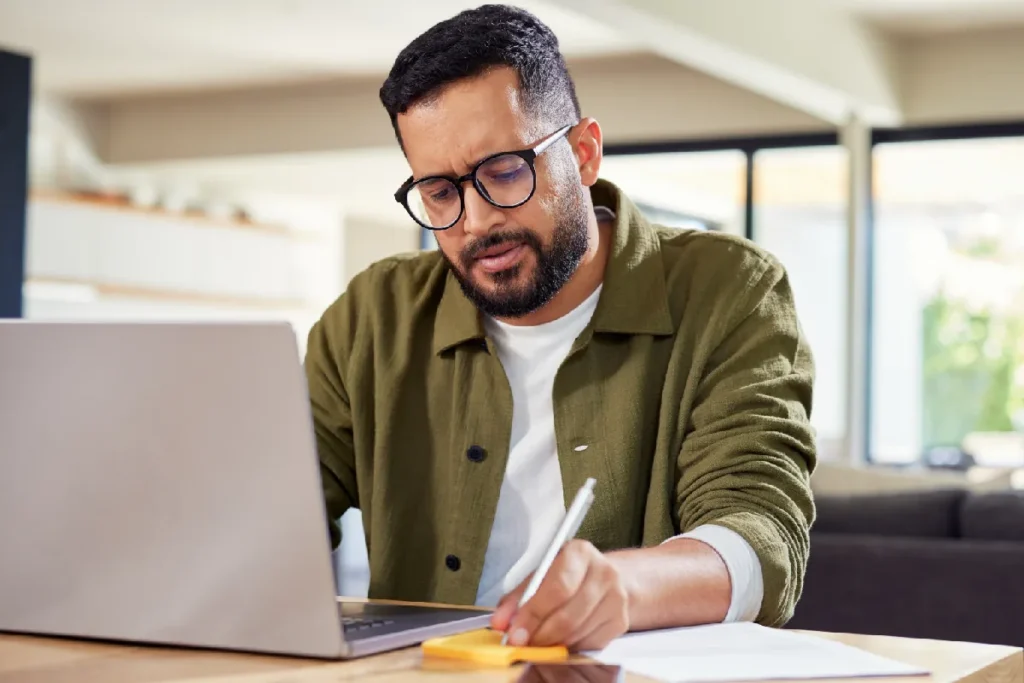 Professional reviewing FMLA paperwork to take protected time off work for treatment without harming their career