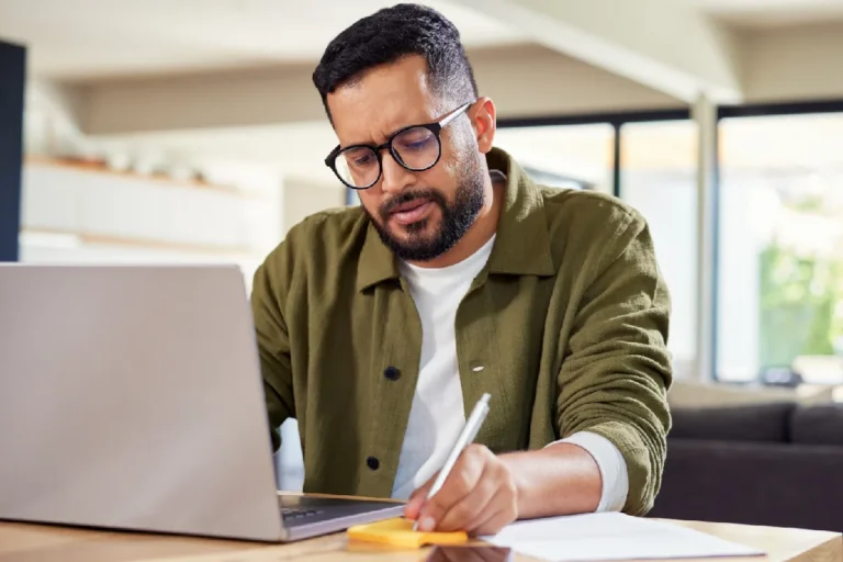 Professional reviewing FMLA paperwork to take protected time off work for treatment without harming their career
